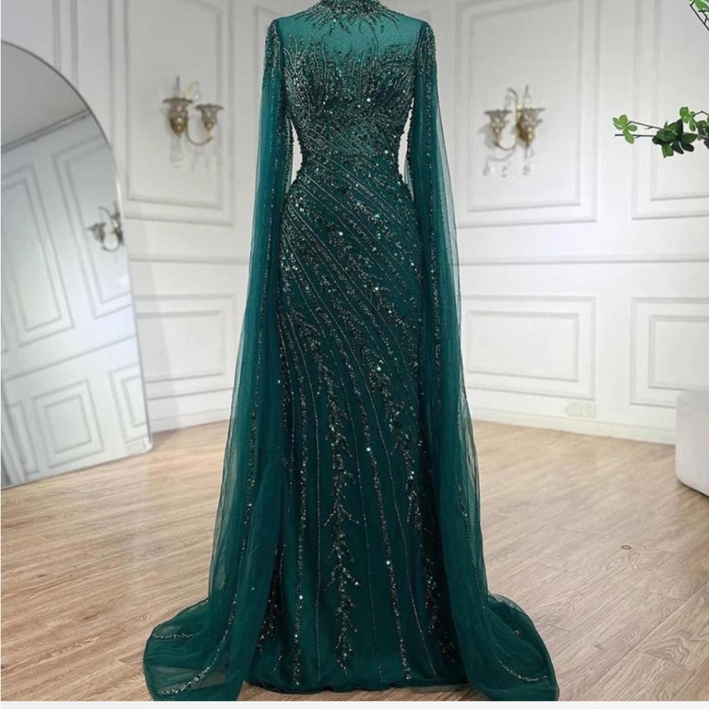 Modest emerald green embellished cape gown